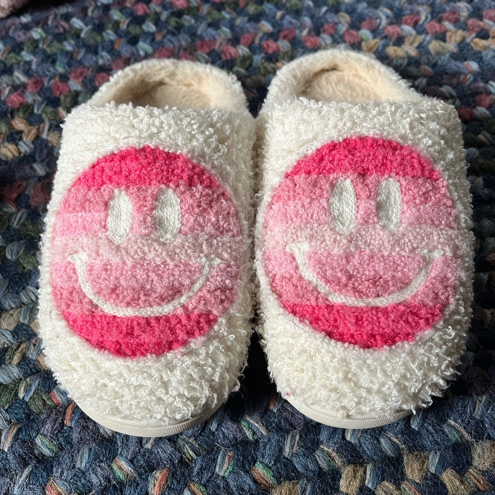 Smiley face slippers.